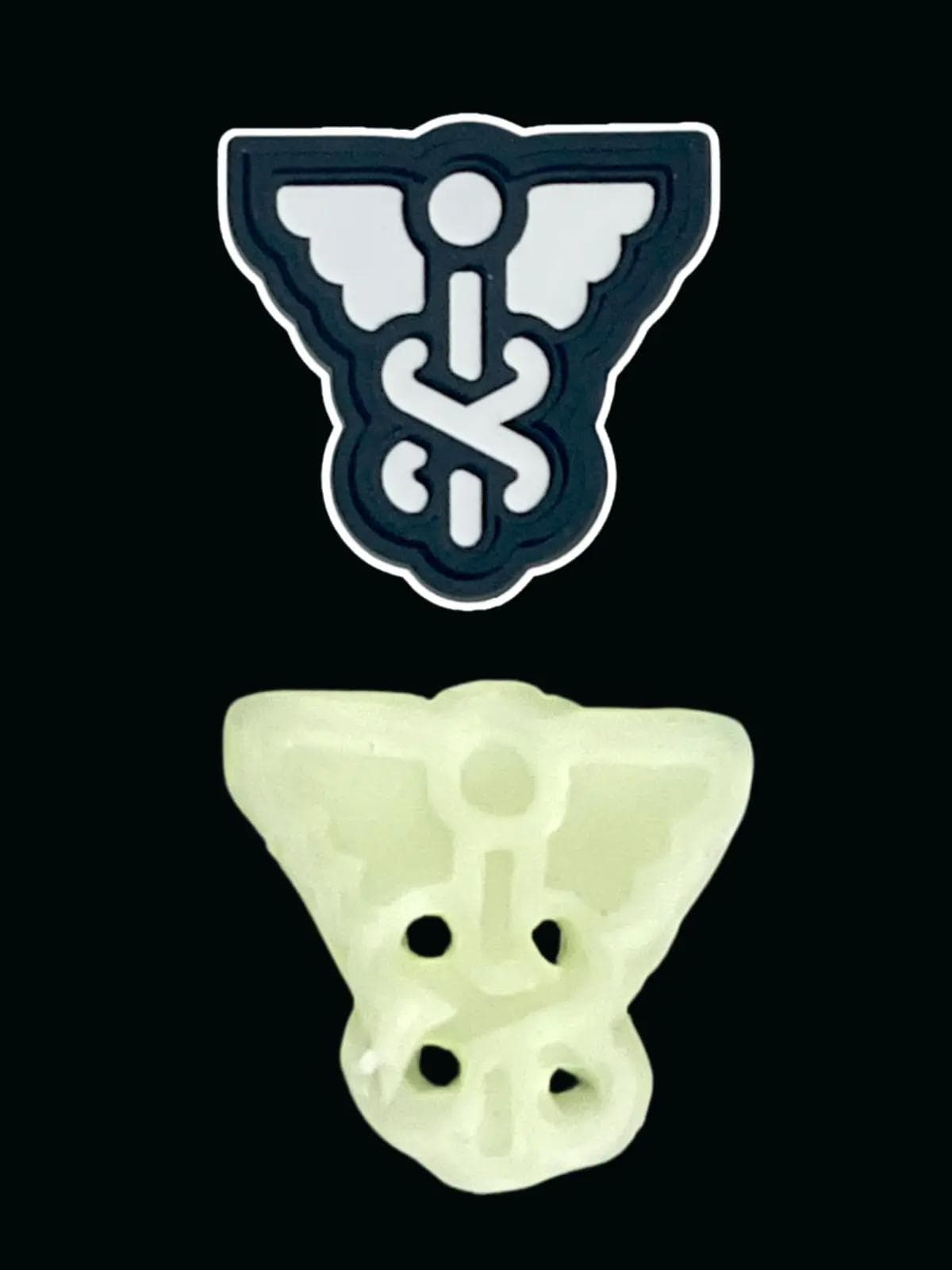 Glow-in-the-dark polymer clay button stamped with the SOME DOSE logo, shown beside the original rubber logo patch on a black background